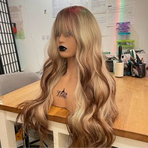 - Human hair blend platinum blonde with brown highlights wig